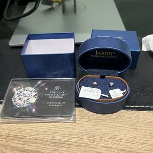 1/2 carat Leo first light diamond earrings rose gold